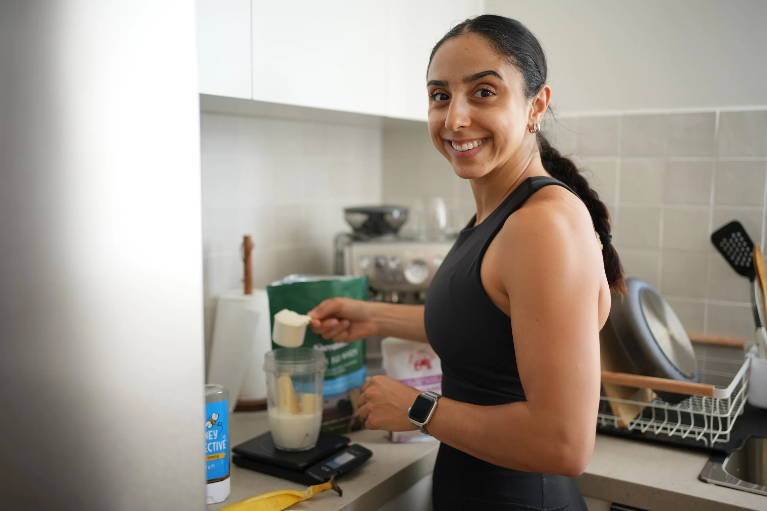 Chanise preparing a protein shake