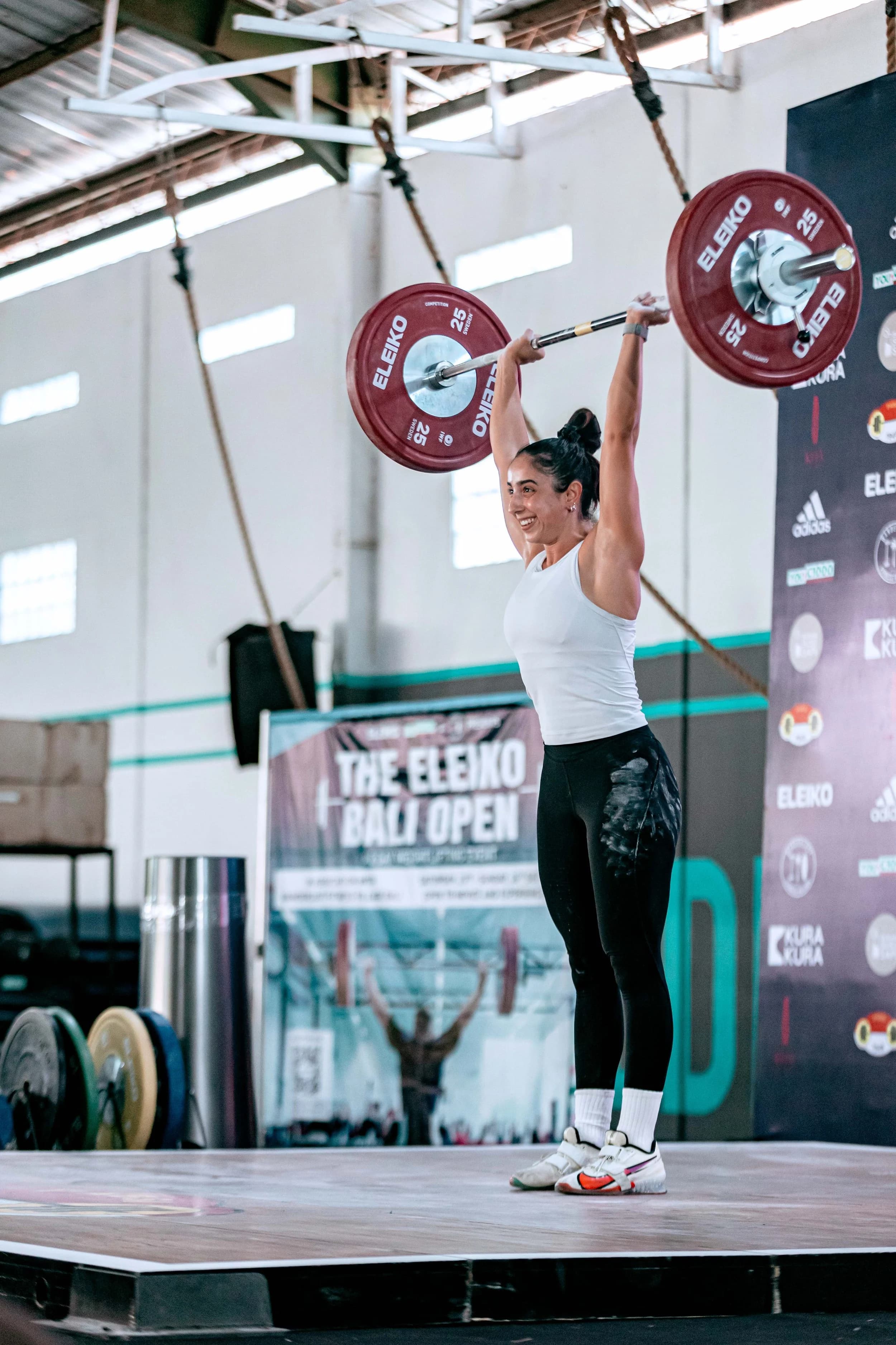 Chanise competing in Olympic weightlifting